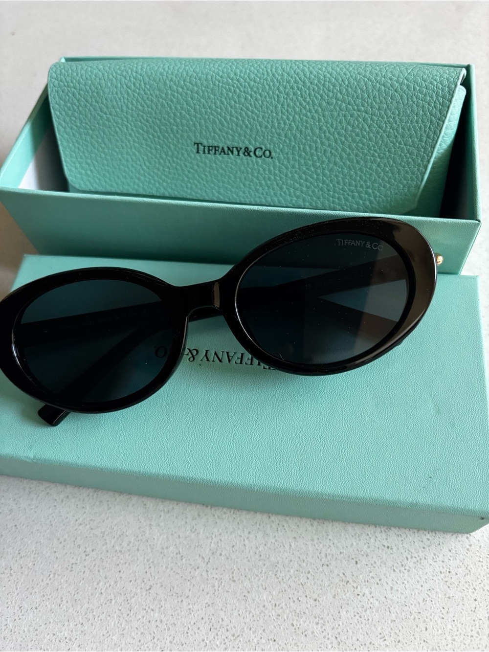 Tiffany & Co. Black Oval Sunglasses with Dark Lenses